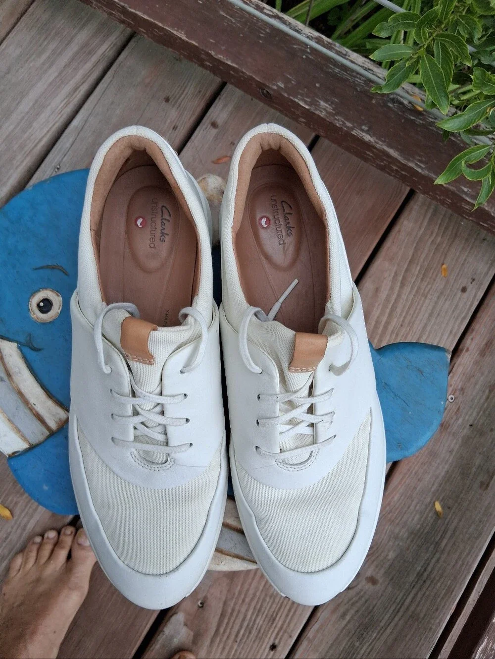Womens White Casual Sneakers with Tan Accents. Body of Shoe Winter White.